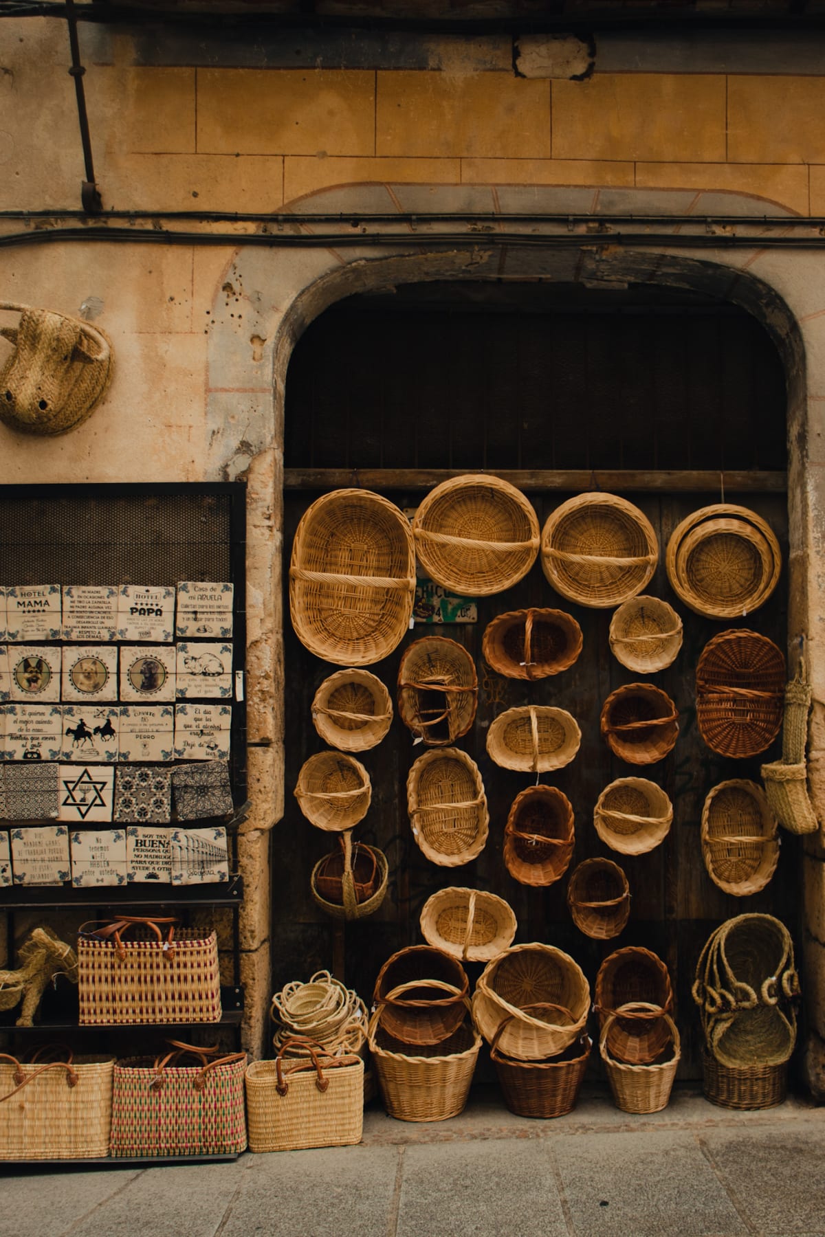 Handwoven baskets displayed outside a traditional shop
