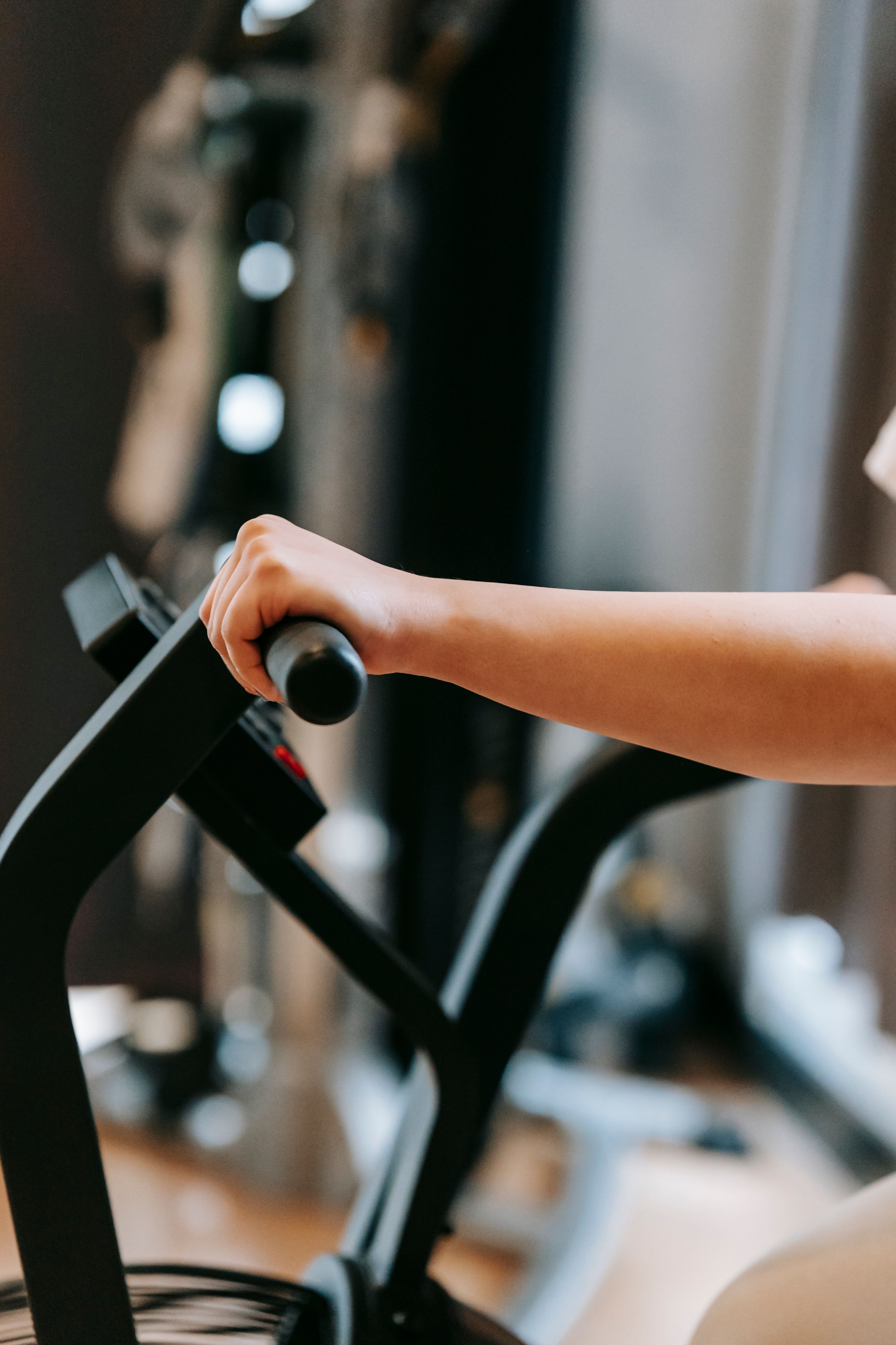 A compact rowing machine and an exercise bike shown as apartment cardio options.
