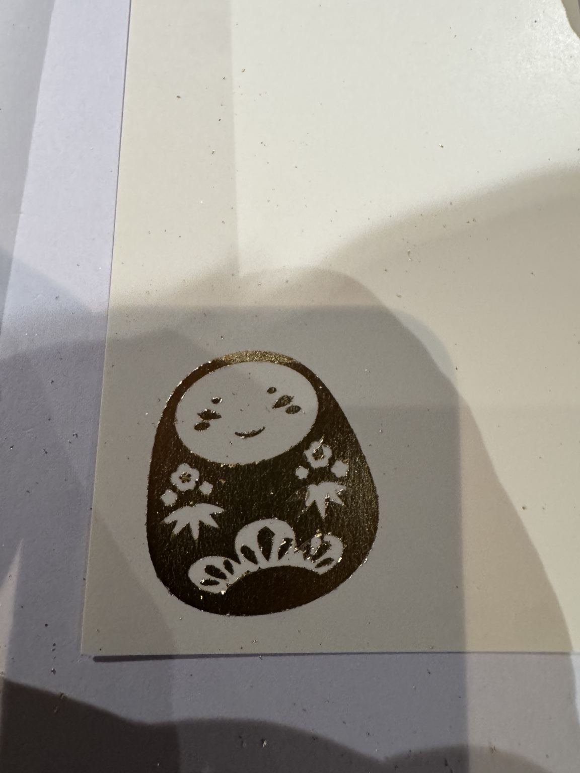 Our golden postcard, a keepsake we decorated ourselves.
