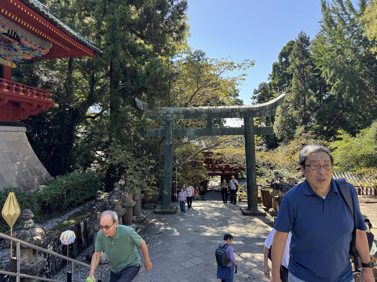 Entrance to a shrine with traditional Japanese architecture.