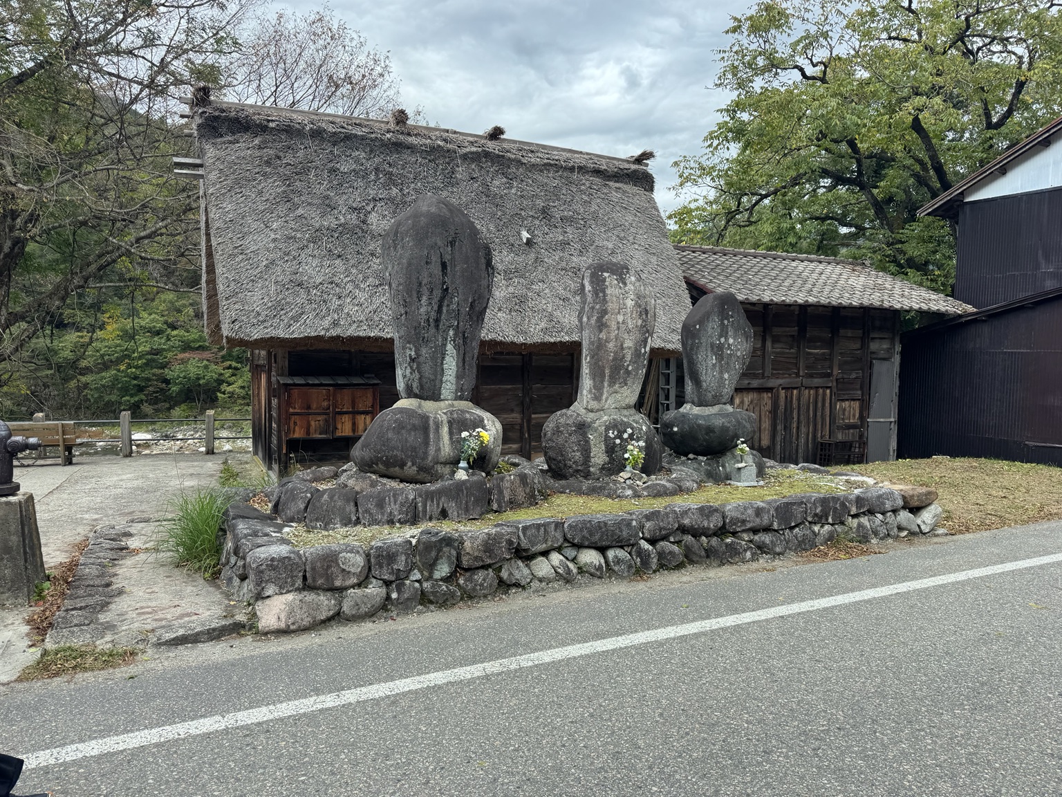 Stone monuments among the old houses.