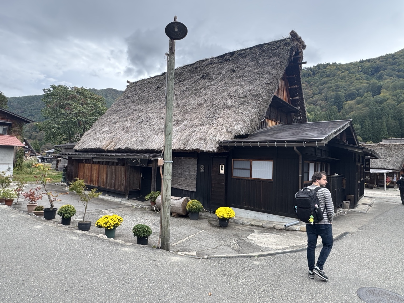 A traditional house with a massive thatched roof in Shirakawa-go.