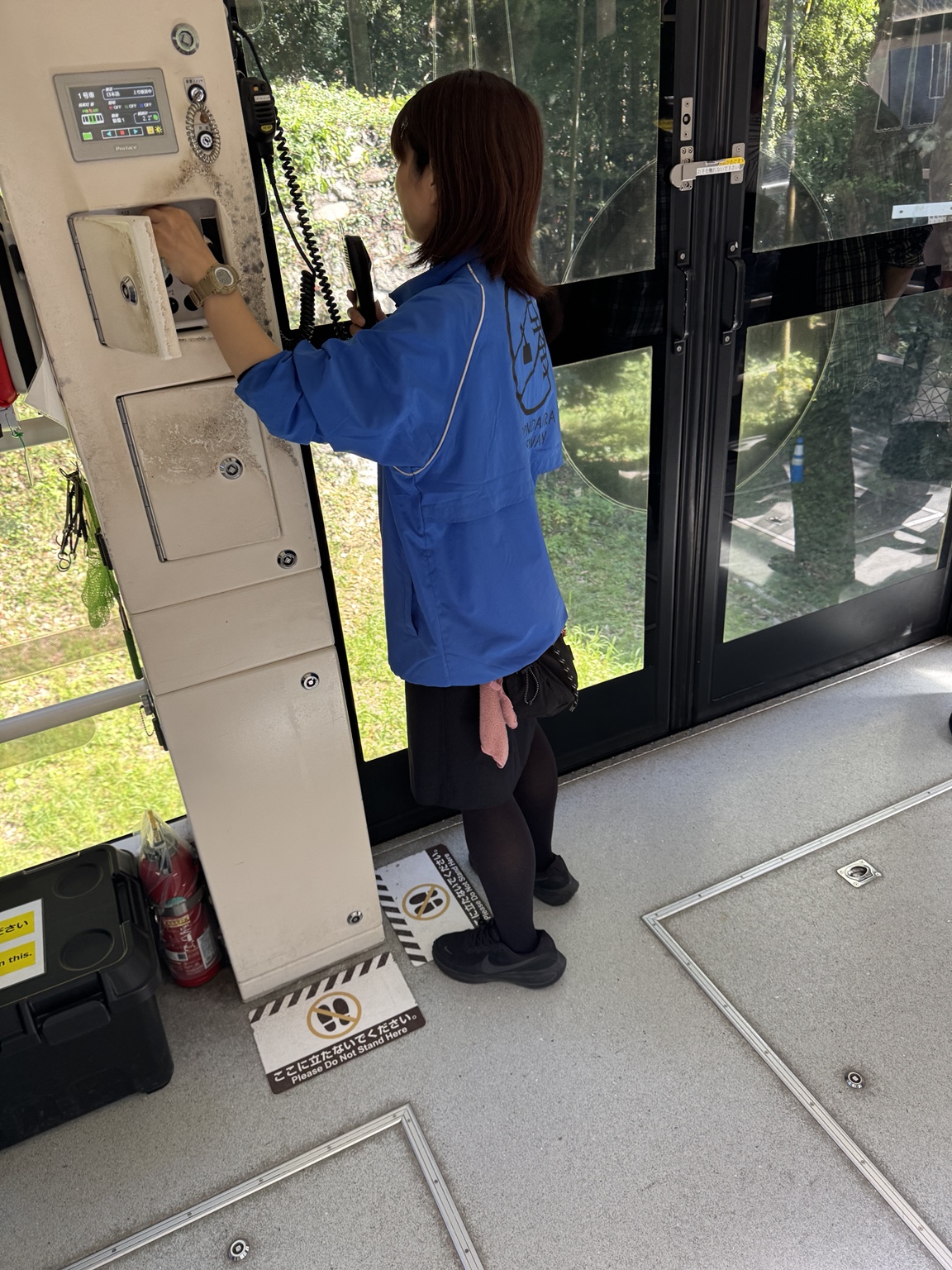 Anneliese at a machine during the journey.