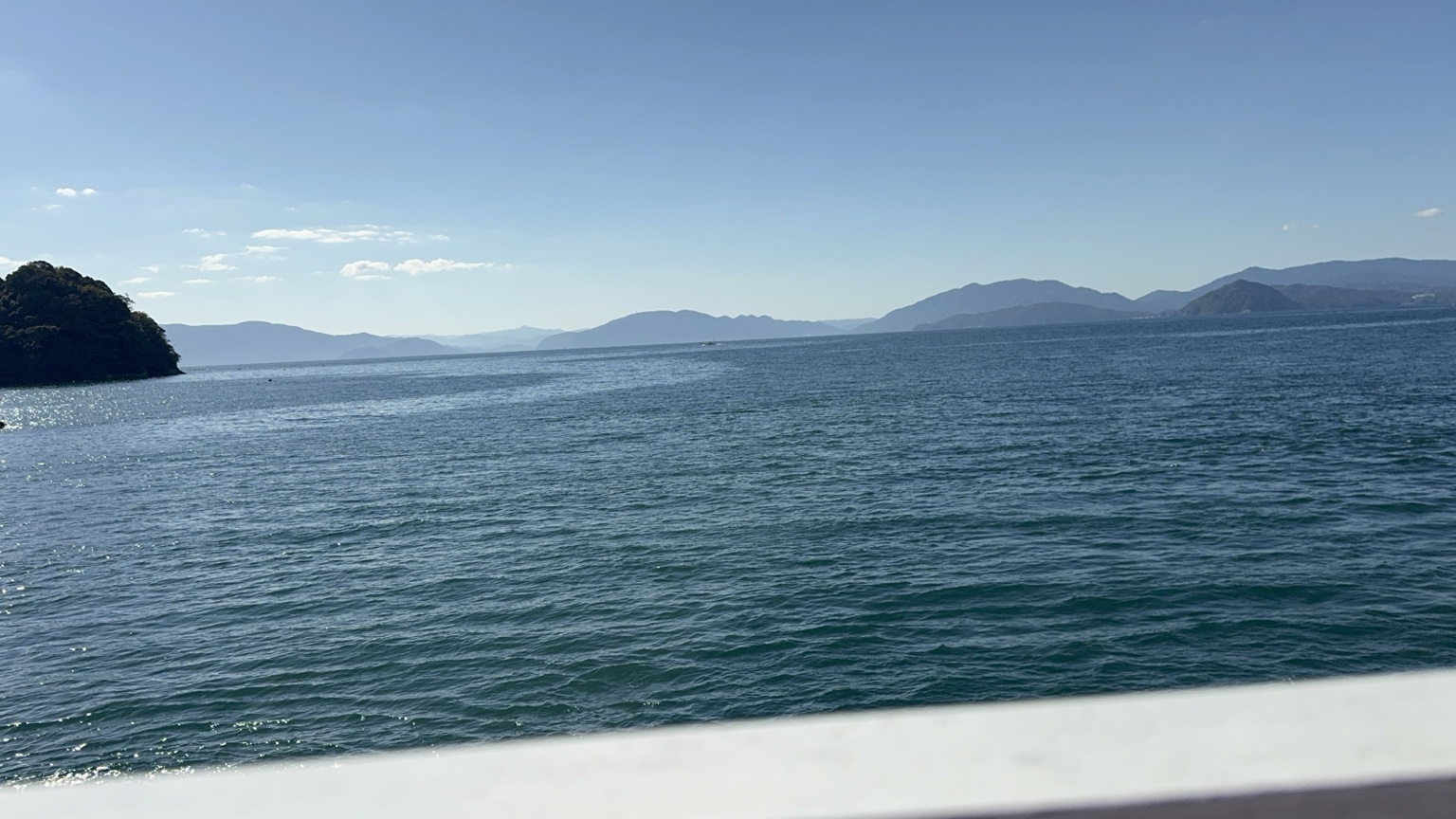 Open water and mountains on the horizon