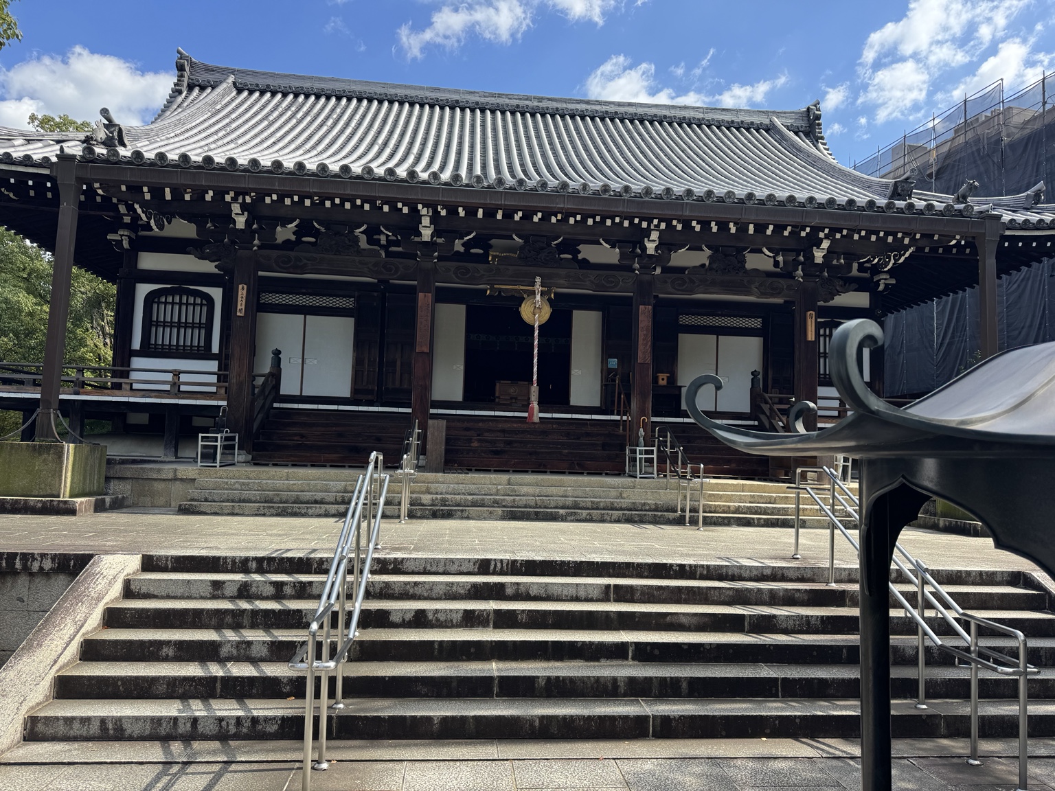 Stone steps leading to a temple hall in Kyoto.