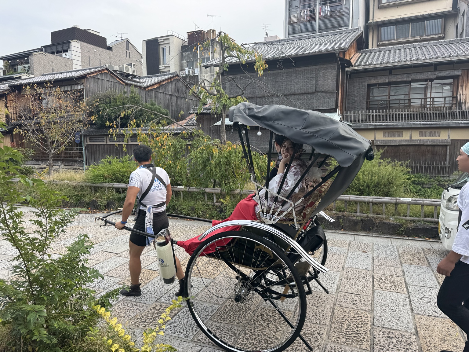 A rickshaw beside the water