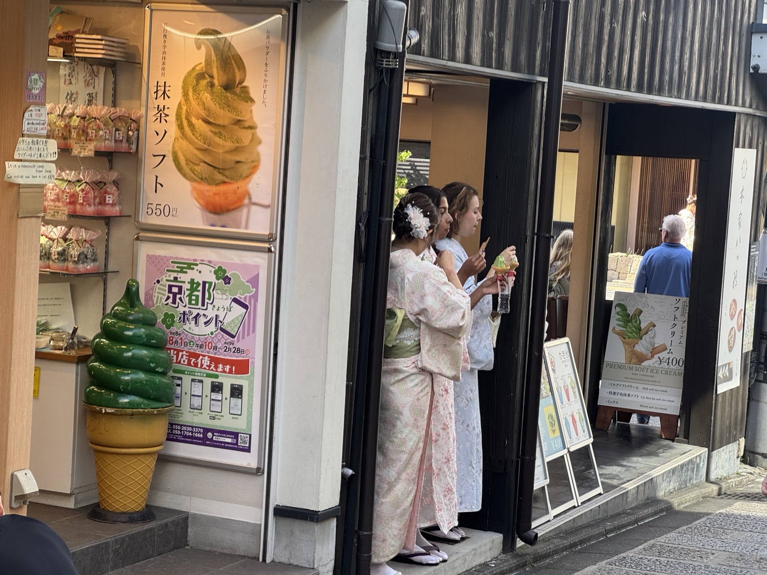 Kimonos outside an ice cream shop in Kyoto’s old lanes.