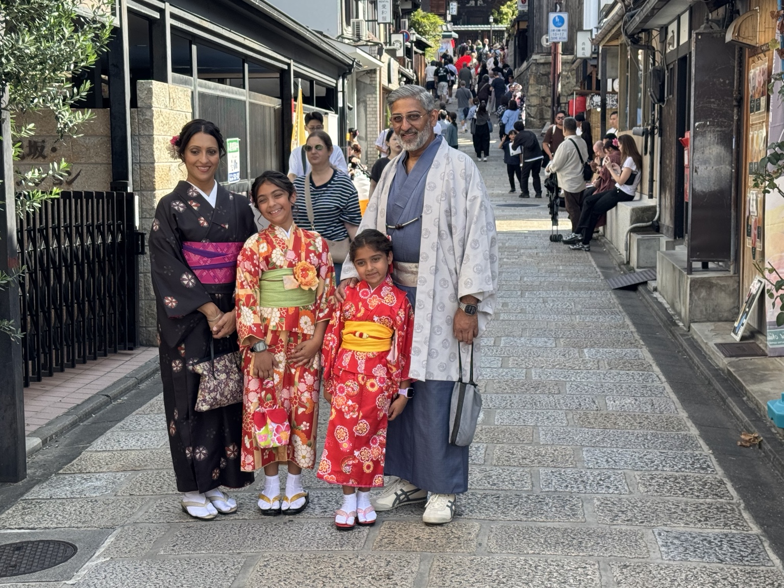 A group in colourful kimonos, right in the heart of the old lanes.