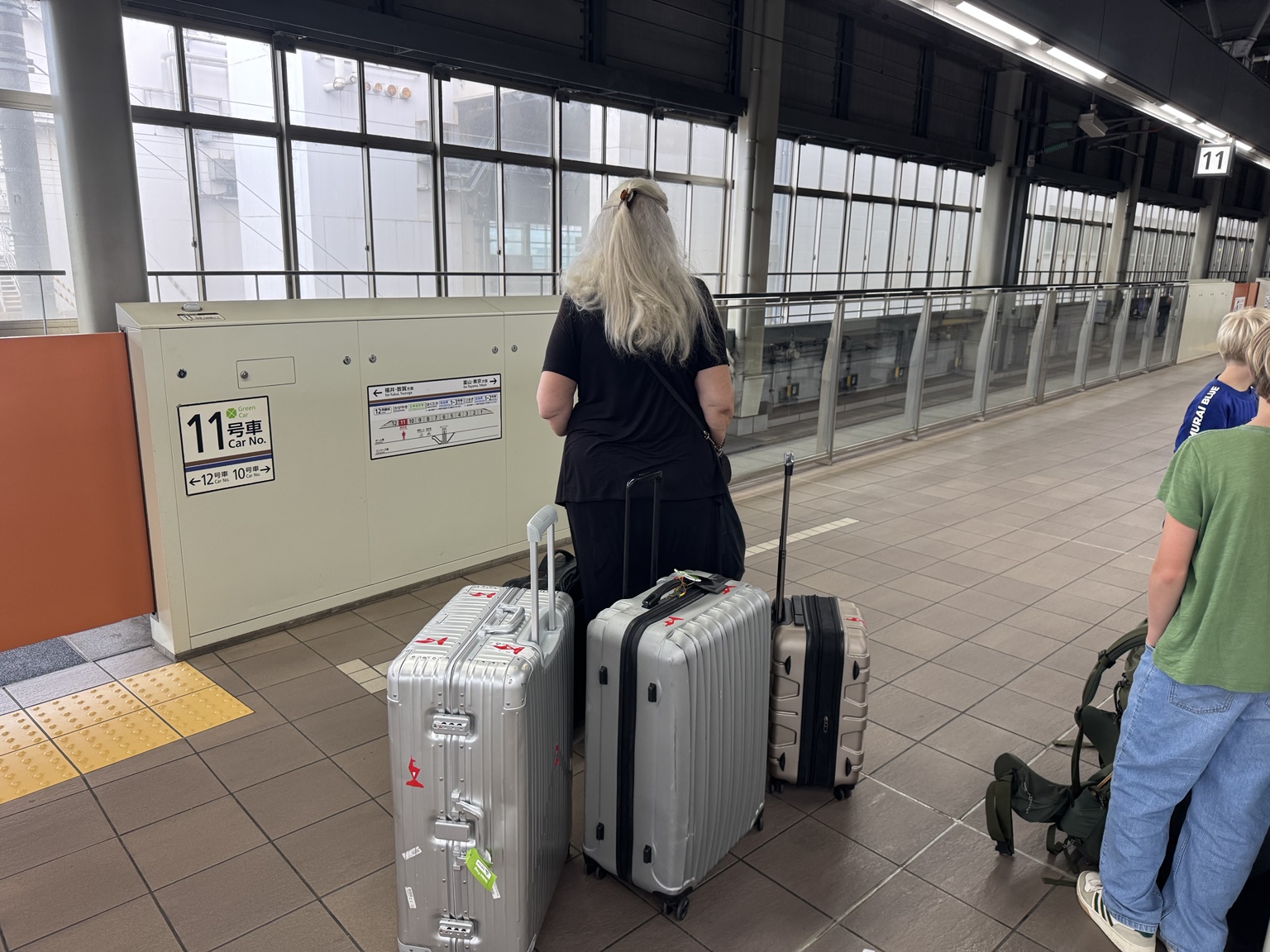 Anneliese and our luggage waiting for the train.