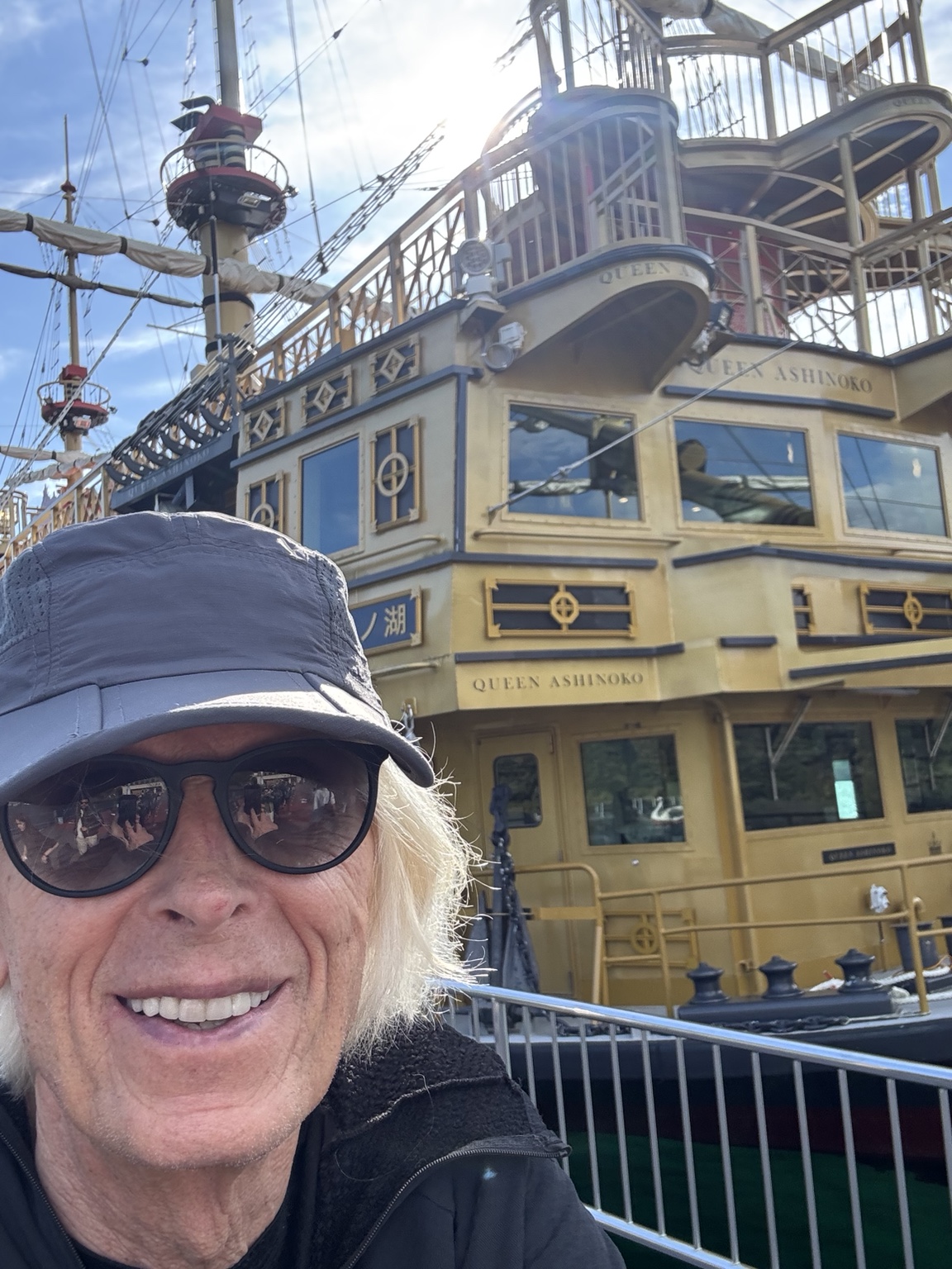 Kurt in front of the pirate ship on Lake Ashi