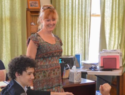 Middle school students working in class at Accelerated Schools