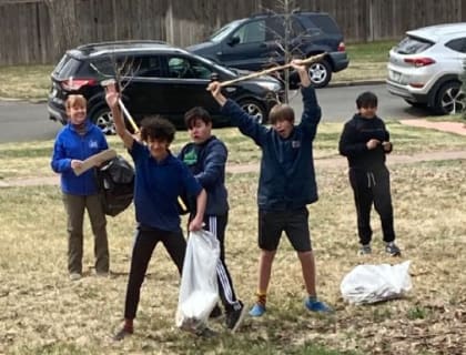 Middle school students learning together in a small class