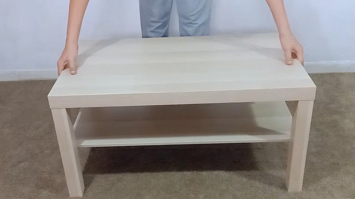 Woman transforms IKEA table with silver foil Woman transforms IKEA table with silver foil - silver foil table