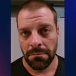 Man arrested after police find marijuana processing room, firearms where 4-year-old lives