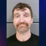 Man arrested after wreck led police to find altered VIN on truck