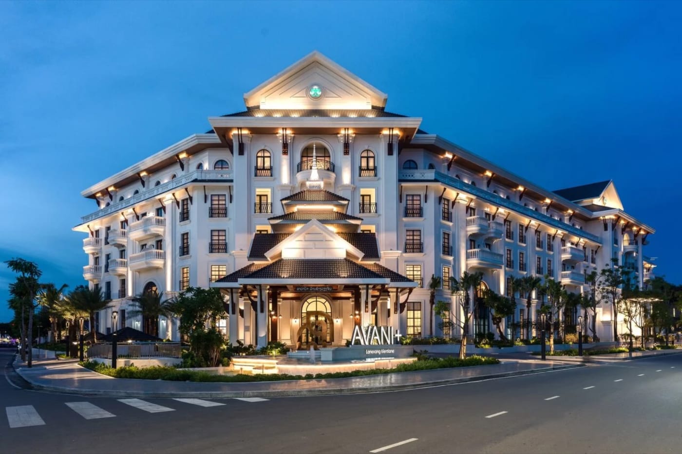 The façade of the Avani+ Lanexang Vientiane in Laos, lit up at night