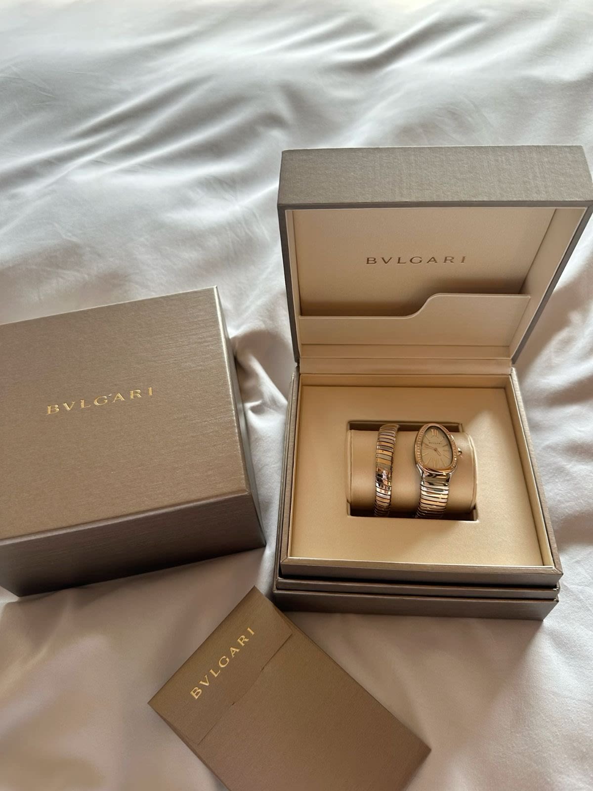 Bvlgari banded rings displayed in their boxes