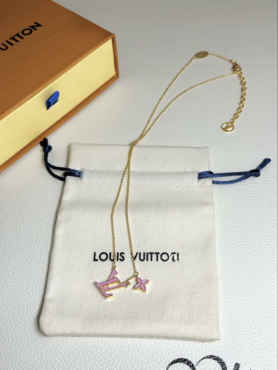 Louis Vuitton monogram pendant necklace with its pouch and box