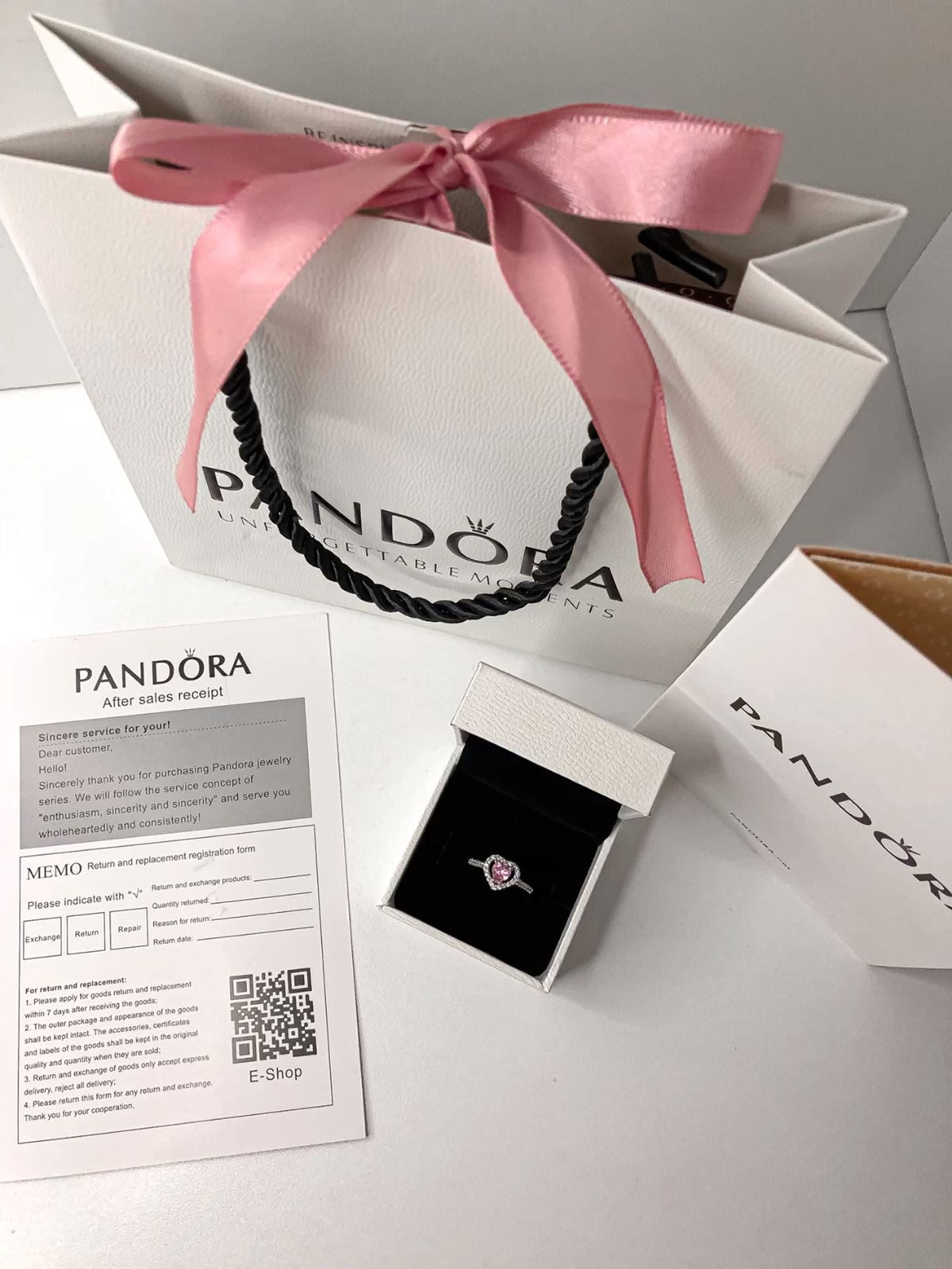 Pandora pendant in its box with gift bag and receipt