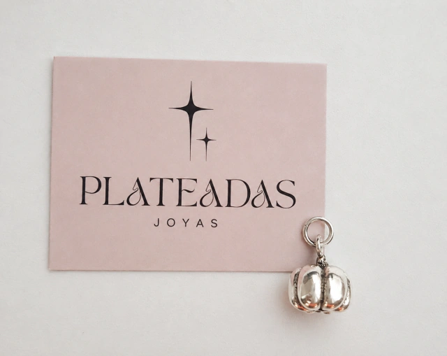 Dije de plata inflada calabaza