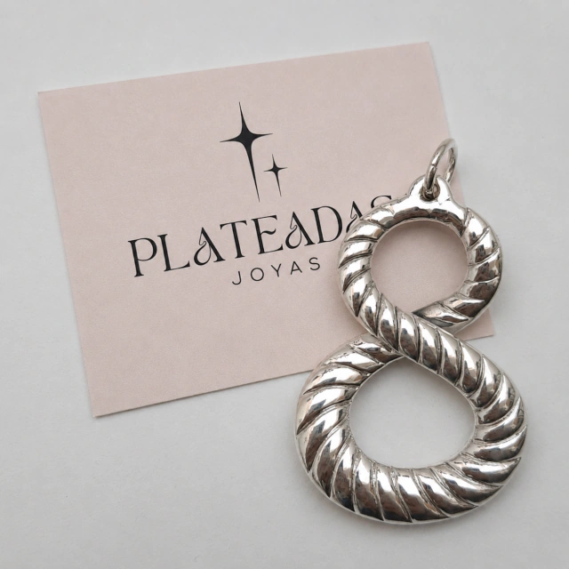 Dije de plata inflada infinito