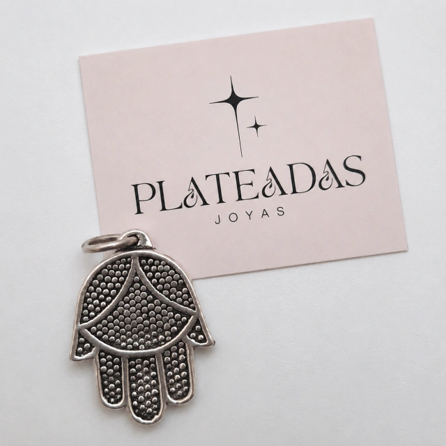 Dije de plata inflada mano de fatima