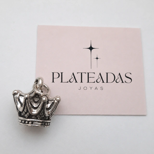 Dije de plata inflada corona