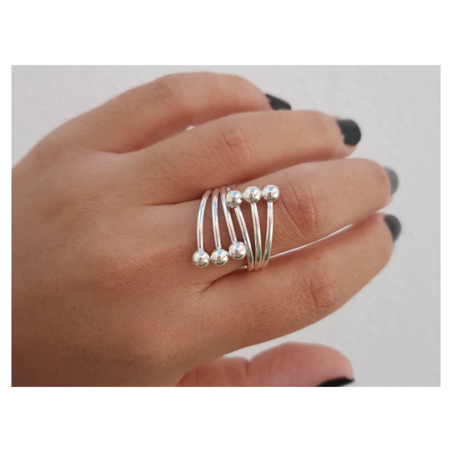 Anillo de plata entrelazado bolitas
