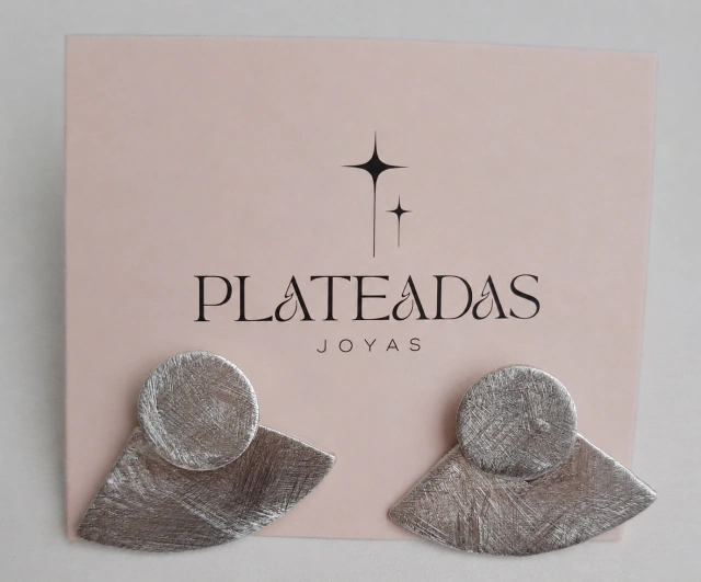 Aros de plata labrada circulo