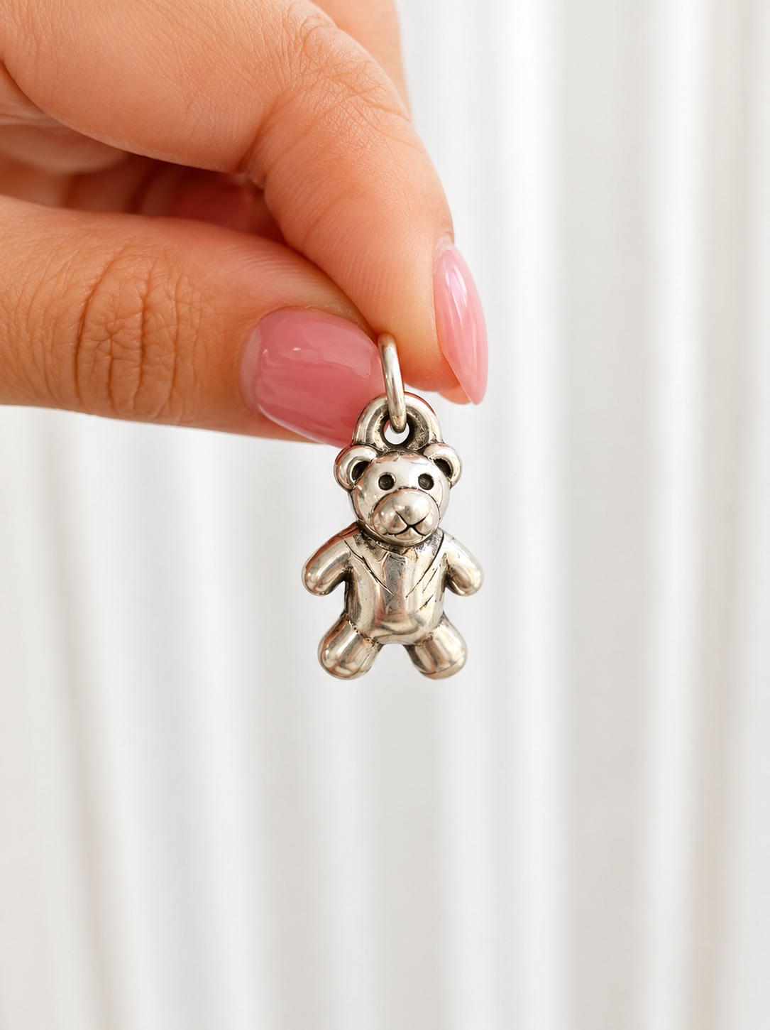Dije de plata inflada oso