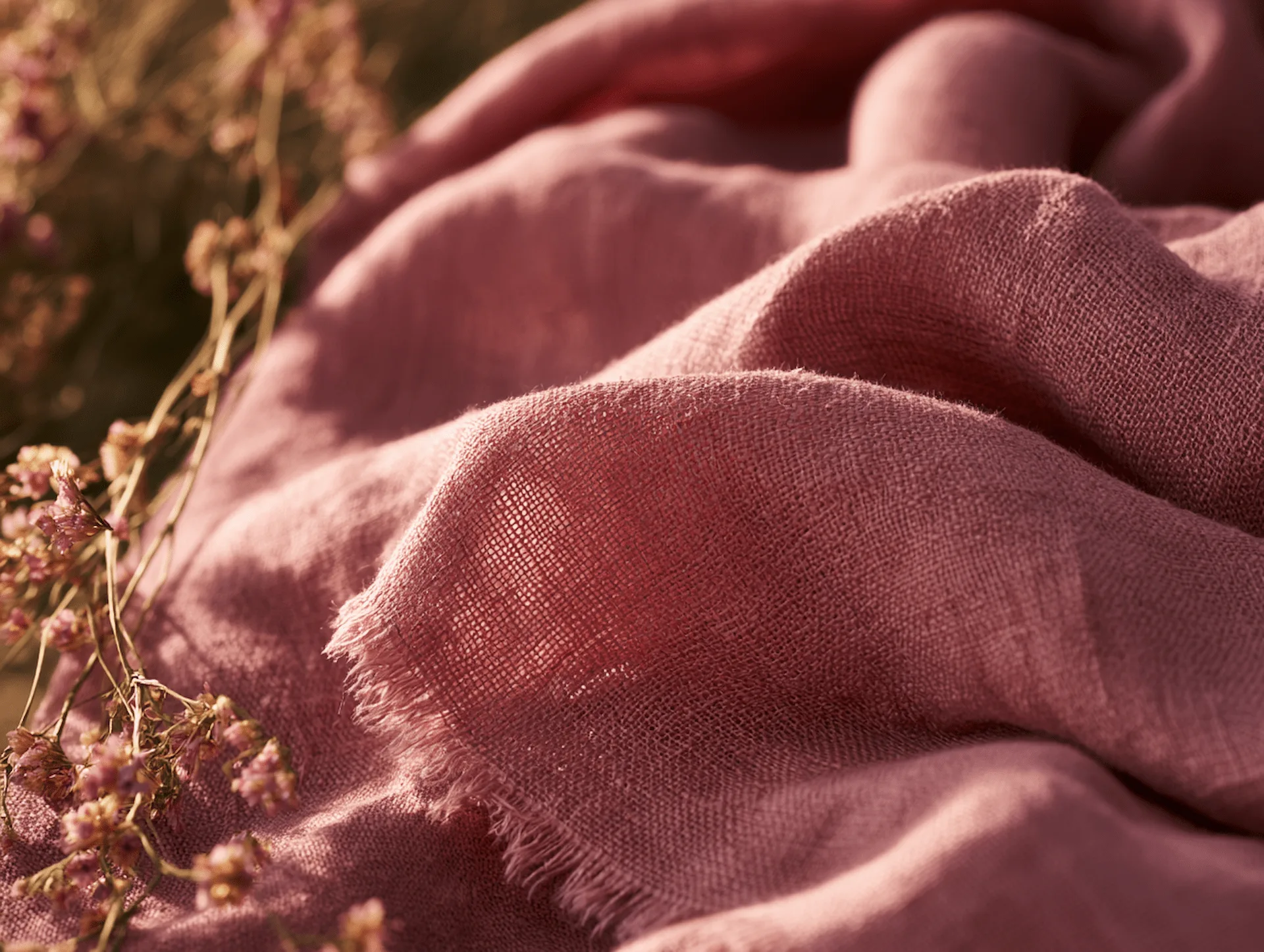 Natural undyed flax linen with visible weave and frayed edges