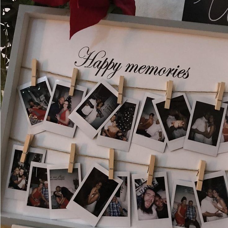 Fifteen rectangular colloies with wooden clip strip and frame and a wooden