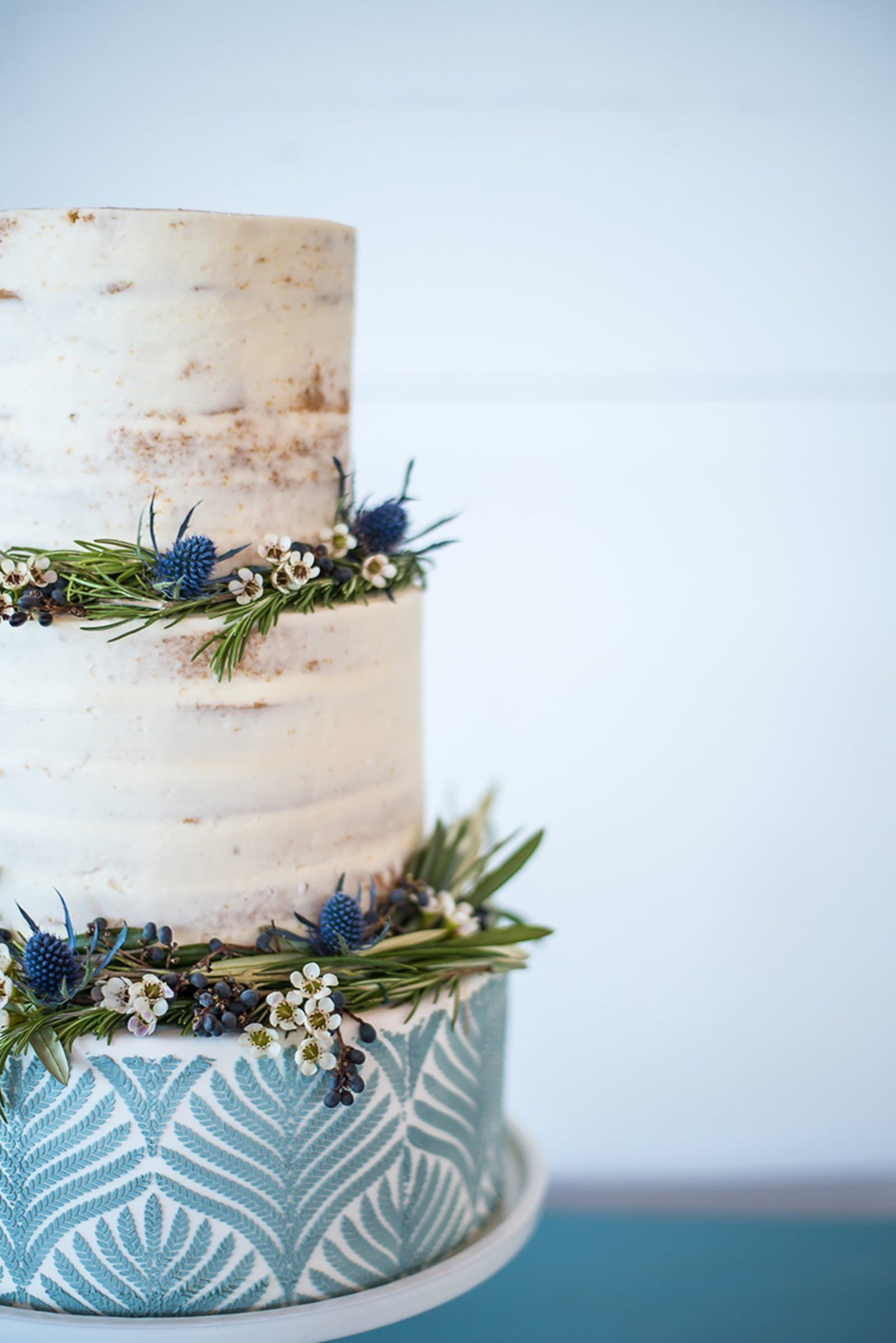 Teal tiered cake half