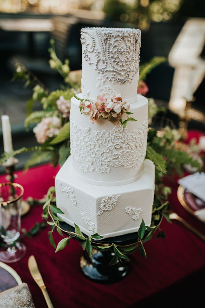 Tiered painted scroll cake
