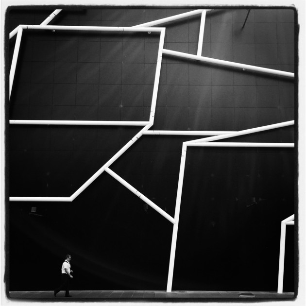 Photo by Douwe Dijkstra from the series 'Mobile Streetphotography.' Winner, 2015 Black and White Photographer of the Year.