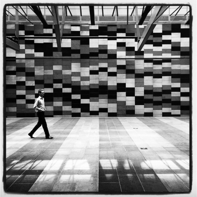 Photo by Douwe Dijkstra from the series 'Mobile Streetphotography.' Winner, 2015 Black and White Photographer of the Year.