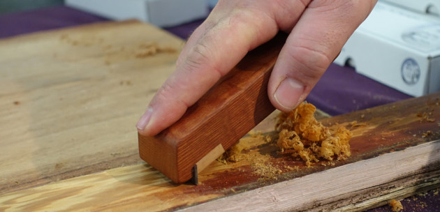 McFarlane scraper in use