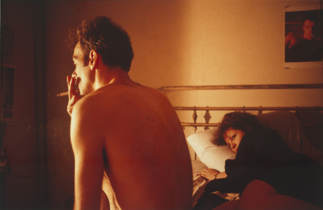 Nan and Brian in bed, New York City 1983 from the series The Ballad of Sexual Dependency 1981-1996 by Nan Goldin. National Gallery of Australia, Canberra.
