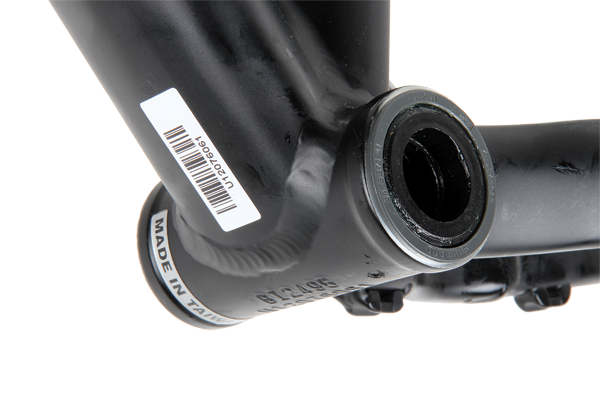 The wider press-fit bottom bracket shell provides more room for mounting the down tube and chainstays.