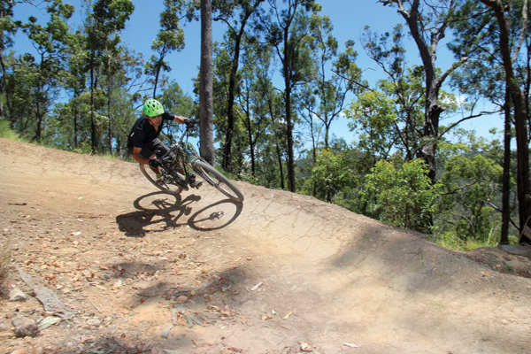 Big berms aplenty on Ricochet, the main DH trail in the Atherton trail network.