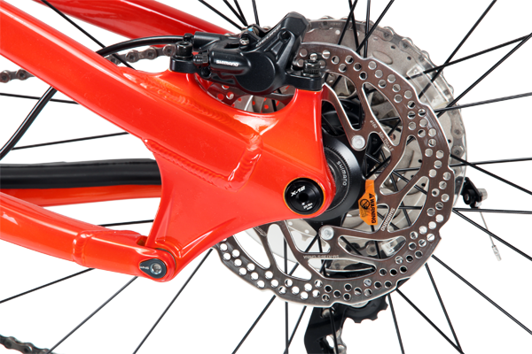 Note the low position of the rear pivot in relation to the axle; this contributes to the rearward axle path that helps the bike carry speed through square edge hits. 