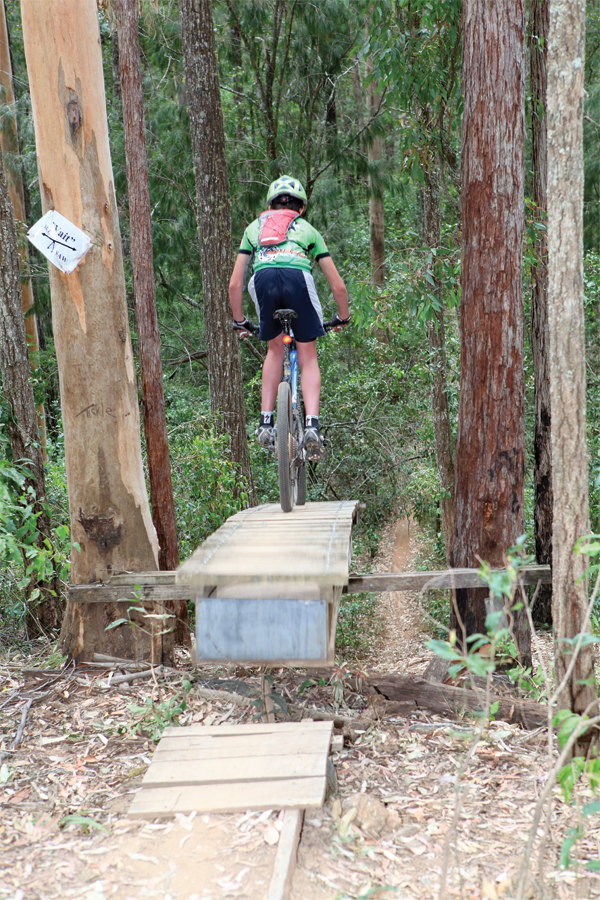 Like the sign says; 'See, wait, saw'. Don't hit this with too much speed or you'll probably soar into orbit! You'll find this gem on the River Trail.