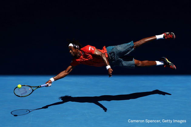 Sports - Second Prize, Singles
Gaël Monfils of France dives for a forehand in his fourth round match against Andrey Kuznetsov of Russia, during the 2016 Australian Open at Melbourne Park, Australia, on 25 January 2016. The Australian Open holds the record for the highest attendance at a Grand Slam event. © Cameron Spencer, Getty Images.