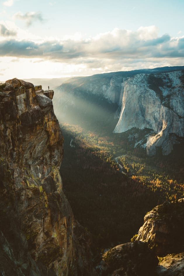 The sun setting over Yosemite Valley as shot from Taft Point while my girlfriend poses on the cliff edge. Shot October 2, 2016 during our road trip across the Americas. Copyright: © Rob Wilson, Canada, Shortlist, Open, Travel, 2017 Sony World Photography Awards.