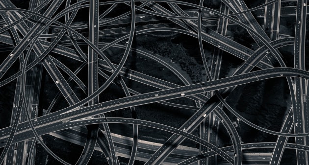 Overlap - Freeway. A variety of urban form and minimalist architecture breaks the old structure, splitting it into triangles, squares and diamond shapes, refracting a new living style on extant spatial structures. Demonstrating a free use of the language of visual forms, it appears like a game, similar to Goldbach’s conjecture; the destruction of the ossified template of the city, a visual exploration of breaking the rules. © Dongni, China, 1st Place, Professional, Architecture, 2017 Sony World Photography Awards.