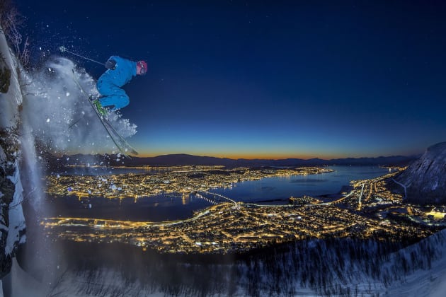 “Urban skiing in the Arctic”. The photographer’s friend descends a 10-metre high clifftop in Tromsø, Norway. It was challenging because the night was much darker than it appears in the photo and it was impossible to see where one might land. The image is the result of a long exposure and using a flash to capture the subject during action. Winner: Sport. (Photo by Audun Rikardsen/SIPA Contest)