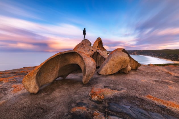 5. Clouds blow past the Remarkable Rocks at Kangaroo Island shortly after dawn. Sony A7R2 ,Canon 16-35mm F4 lens. 200s @ f16, ISO 100. Sirui carbon fibre tripod , RRS BH55 ballhead , Nisi 10 stop ND filter and CPL. Blending of separate exposure for human presence, colour and contrast adjustments in Adobe Photoshop CC.