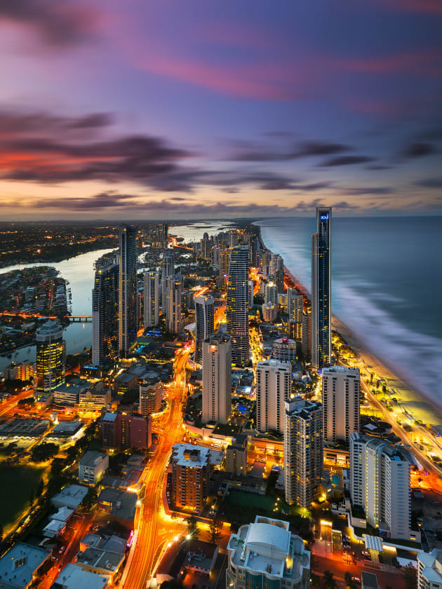 Sunset as seen from Q1 observation deck on the Gold Coast. Sony A7R2 , Canon 16-35mm F4 lens. 100s @ f11, ISO 100. 2 exposures 20 minutes apart. Sirui carbon fibre tripod , RRS BH55 ballhead Nisi 6 stop ND filter, Nisi 3 stop hard edged GND. Exposure blending, colour and contrast adjustments in Adobe Photoshop CC.