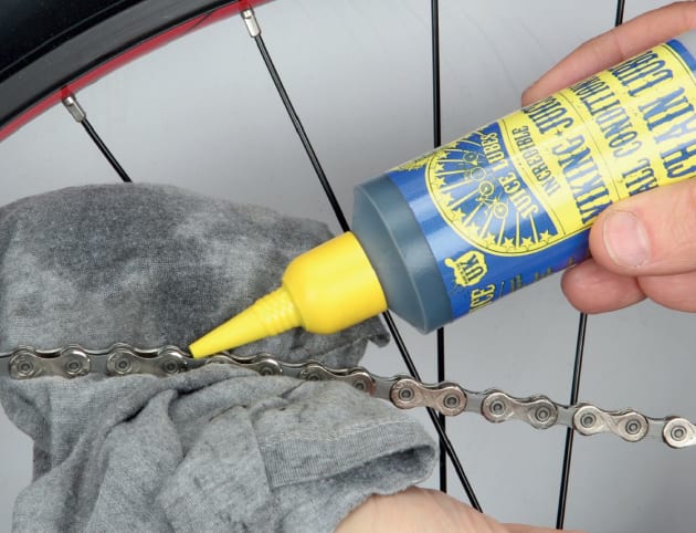 A quick clean; apply lube to loosen any gunk and thoroughly wipe the chain over.