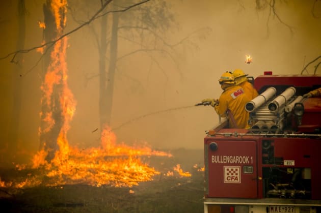 CFA crews race to save properties near Lancefield, Victoria, in an unusually early start to the fire season. © Jason Edwards.